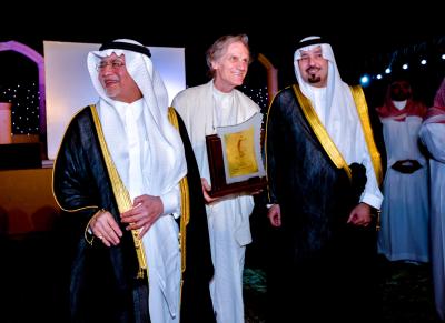 with H.R.H. Prince Mishal Bin Abdallah Bin Abdul Aziz (right) governor of Najran Region and H.E. Dr. Abdul Aziz Khojia (left) Minister of Culture (2013).